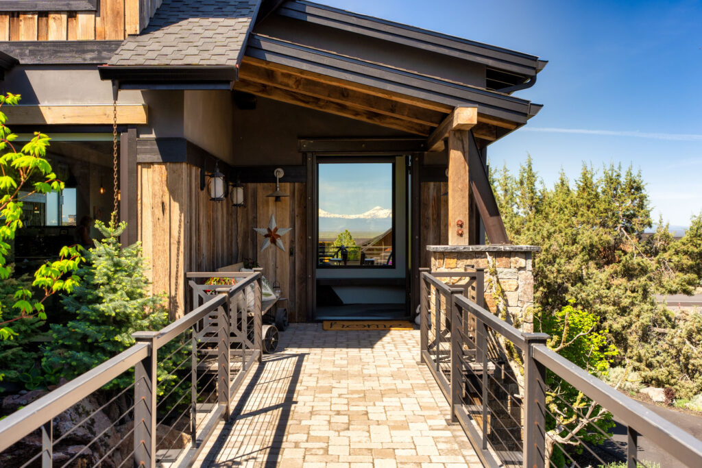 Modern mountain home with deck at twilight — real estate photography by Pro Property Photos by Wasim, Bend, Oregon.