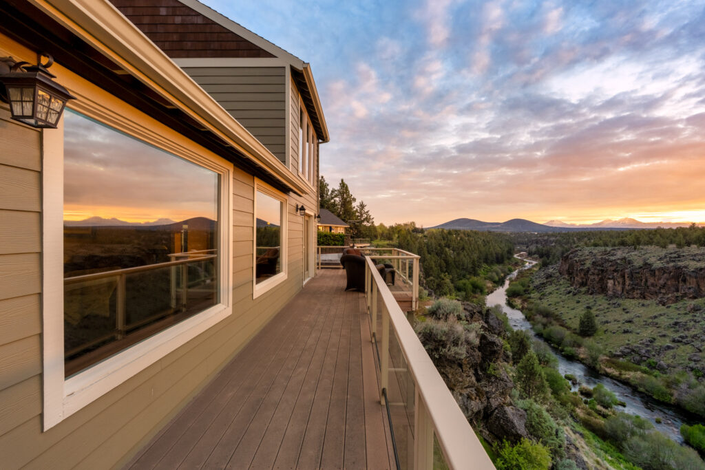 Picture window framing a Cascade sunset — real estate photography by Pro Property Photos by Wasim, Bend, Oregon.